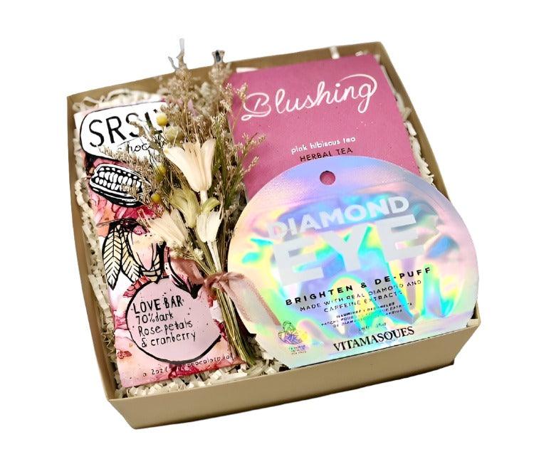 gift box for bride-to-be with chocolate bar, herbal tea and de-puffing eye mask. wedding and bridal gifts.
