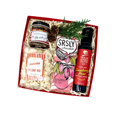 Austin themed gift box with holiday goodies. Includes Round Rock jam, texas hill country cranberry pear balsamic vinegar, holiday popcorn and peppermint chocolate bar.