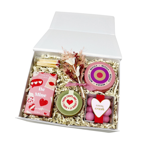 valentines day gift box with candle, matches, candy, peppermint chocolate and shower steamers