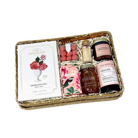 Best Mom Ever mother's day gift box with hibiscus rose shortbread cookies, hibiscus rose tea, honey, drizzle stick, lavender bergamot candle, matches, strawberry gummies, lily & rose shower steamers and a handmade dried floral bundle