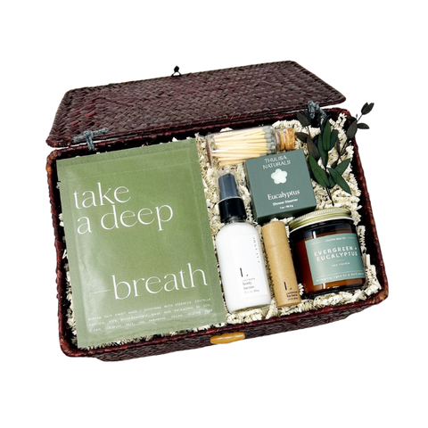 spa day gift box with korean facial sheet mask, lavender lotion and lip balm, eucalyptus shower steamer, eucalyptus candle and matches