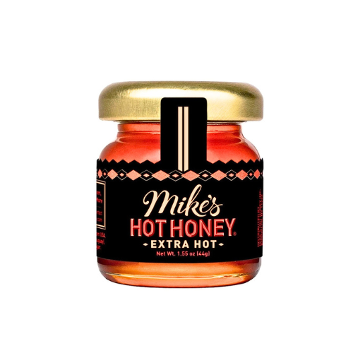 A 1.5 oz mini jar of Mike's Extra Hot Honey. Perfect for any food item you want to add a fiery kick too! 