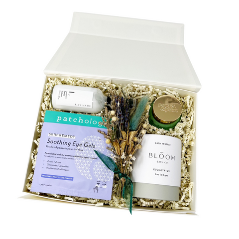 Gift set with eye gels, bath truffle, lavender lotion and mint lip scrub with a handmade dried floral bundle.