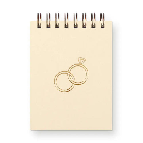 A 3x4 mini gold-foil pressed ring notebook with 65 unlined pages. Perfect for notes, lists, or sweet doodles.
Made in the United States.